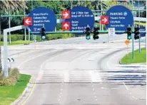  ?? JOE BURBANK/ORLANDO SENTINEL ?? Universal Boulevard was deserted last week as the theme parks and hotels remain closed in response to the coronaviru­s pandemic.