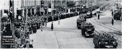  ??  ?? TERROR Nazi troops in 1940 in Amsterdam