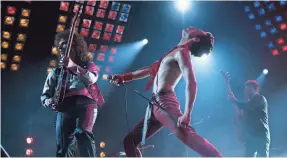  ?? TWENTIETH CENTURY FOX FILM ?? From left, Gwilym Lee (Brian May), Rami Malek (Freddie Mercury) and Joe Mazzello (John Deacon) star in “Bohemian Rhapsody.”