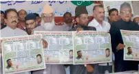  ??  ?? The All-India Tahafuz Sheriyath Conference releases posters of various communitie­s against uniform civil code in Hyderbad on Saturday.