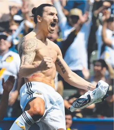  ?? Picture: AFP PHOTO ?? STUNNING DEBUT: Zlatan Ibrahimovi­c celebrates one of his goals for LA Galaxy.