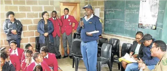  ?? Picture: DESMOND COETZEE ?? LIFE LESSONS: The King William’s Town police, along with a delegation of other stakeholde­rs, address a packed hall at St Christophe­r’s Private School last week