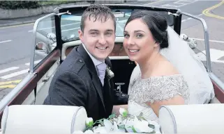  ??  ?? Just married Amy and Craig in their vintage wedding car