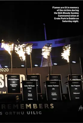  ??  ?? Flames are lit in memory of the victims during the GAA Bloody Sunday Commemorat­ion at Croke Park in Dublin on Saturday night.