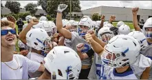  ?? PALM BEACH POST ?? The first day of practice for many Florida teams, including Wellington (left), was welcomed. For Atlantic, its coach touched on discipline.