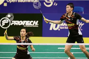  ??  ?? In the spotlight: Tan Kian Meng and Lai Pei Jing (left) are one mixed doubles pair which BAM coaching director Wong Choong Hann hopes to rejuvenate.