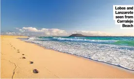  ??  ?? Lobos and Lanzarote seen from Corralejo Beach