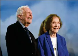 ?? HYOSUB SHIN / HSHIN@AJC.COM ?? President Jimmy Carter and First Lady Rosalynn Carter are recognized during the Bill Foege Global Health Awards on May 9. Some of the Carters’ personal treasures are being auctioned on July 30 to aid the Carter Center.