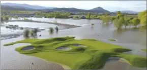  ?? Contribute­d ?? An aerial photo of the flooded Kelowna Springs golf course in 2017.