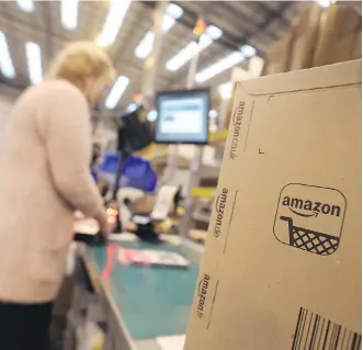  ?? CHRIS RATCLIFFE/ BLOOMBERG ?? Amazon is being blamed for difficulti­es faced by Canadian malls, but others argue company failures are just part of the retail “churn.”