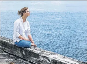  ?? CP PHOTO ?? Anika Riopel, who is part of a team pitching a public swimming area for the Halifax Harbour, poses on the waterfront in Halifax on Friday.