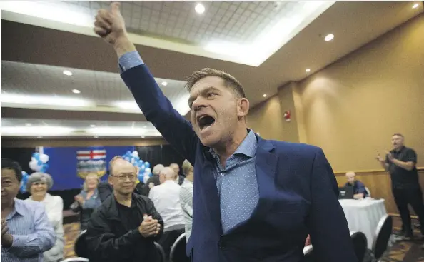  ?? DAVID BLOOM ?? A pumped-up Wildrose leader Brian Jean celebrates the yes vote following the party’s vote on uniting with the Progressiv­e Conservati­ves in Red Deer on Saturday. “With tonight’s vote, the NDP’s time in government is ticking down, and ticking down...