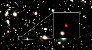  ?? ?? The distant early galaxy HD1, object in red, is shown at the centre of this image.