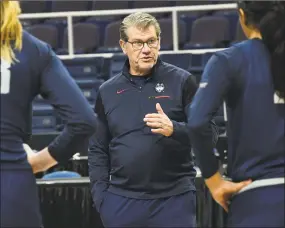  ?? Lori Van Buren / Albany Times Union ?? UConn coach Geno Auriemma talks to his players during a ractice last season.