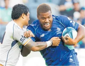  ?? Photo / Photosport ?? Fijian Drua’s Tevita Ikanivere takes on the Moana defence.