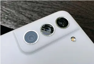  ?? ?? Triple rear cameras include a 12MP, f/1.8, wide-angle. Dual Pixel PDAF, OIS / 12MP, f/2.2, ultra-wide, 123° FOV / 8MP, f/2.4, telephoto, 3x Optical Zoom