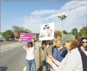  ?? Liana Teixeira / Hearst Connecticu­t Media ?? Melissa Kane, left, a member of the Westport Board of Selectmen, and Vicki Volper, of the ReSisters, hold signs during a protest Westport on May 17 against Alabama abortion laws.