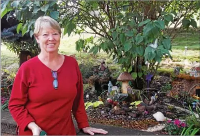  ?? PHOTOS BY REBECCA BLANCHARD — DIGITAL FIRST MEDIA ?? Lynn Bialek, founder of the Birdsboro Garden Club, has built a fairy garden in her backyard.