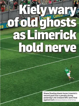  ?? BRENDAN MORAN/ SPORTSFILE ?? Shane Dowling blasts home Limerick’s second goal from a penalty during yesterday’s All-Ireland SHC semi-final against Cork