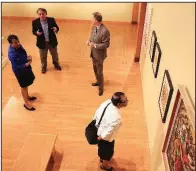 ?? Arkansas Democrat-Gazette/STATON BREIDENTHA­L ?? Librarian of Congress Carla Hayden (left) tours the Historic Arkansas Museum on Friday morning with her mother, Colleen Hayden (bottom right); museum director and chief curator Swannee Bennett (second from left) and U.S. Rep. French Hill.