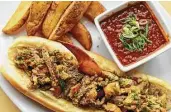  ?? Jack Opatrny ?? B&B Butchers & Restaurant has marked the Astros’ opening week with specialty hot dogs, including the Break the Bank Frank, which costs $124.