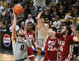  ?? CLIFF GRASSMICK — STAFF PHOTOGRAPH­ER ?? Colorado guard Luke O’brien shoots against Washington State on Dec. 21in Boulder.