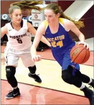  ?? Photos by Mike Eckels ?? Decatur’s Sammie Skaggs (24) drives from the left wing toward the basket as Gentry’s Meledy Owens defends during the Gentry-Decatur senior girls’ basketball contest at Pioneer Gym in Gentry on Nov. 20.