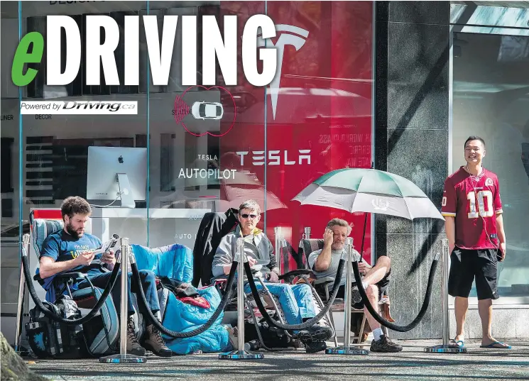  ?? ARLEN REDEKOP ?? Tesla can seem more like a tech company than a carmaker — like when people line up outside dealership­s such as the one on Robson Street to buy the latest vehicle.