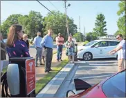  ?? Kevin Myrick ?? Cedarstrea­m’s Jamie Morris talks about how his hopes are to see Cedartown become a destinatio­n for travelers driving electric cars and who need a charge along their way. /