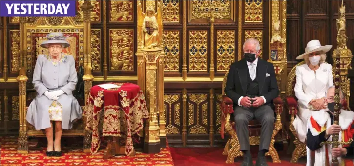  ??  ?? Duty: The Queen seated apart from Charles and Camilla in the House of Lords yesterday – her first engagement since Philip’s funeral – due to social distancing