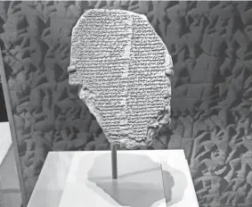  ?? PHOTOS BY U.S. IMMIGRATIO­N AND CUSTOMS ENFORCEMEN­T VIA AP ?? This undated image shows a 3,500-year-old artifact, known as the Gilgamesh Dream Tablet. The tablet contains a portion of the Epic of Gilgamesh, considered one of the earliest surviving works of notable literature.