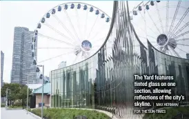  ?? | MAX HERMAN/ FOR THE SUN- TIMES ?? The Yard features tinted glass on one section, allowing reflection­s of the city’s skyline.