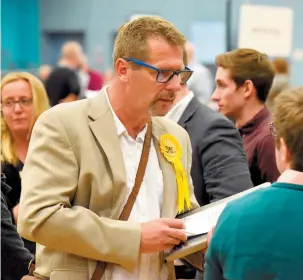  ?? ?? John Baldwin, former Belmont ward councillor, at the 2019 election count in Maidenhead.