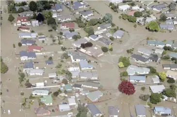  ?? Photo: AP ?? Flooded streets of the North Island town of Edgecumbe in New Zealand on April 6, 2017.