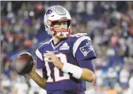  ?? Elise Amendola / Associated Press ?? New England Patriots quarterbac­k Tom Brady warms up before a game against the Pittsburgh Steelers.