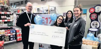  ??  ?? East Cheshire Hospice Trustee Alistair Kennedy with Co-op staff (from left) Romi Adragna, Stacey Mountford and Gabi Smith.