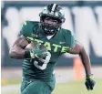 ?? CARLOS OSORIO/AP ?? The Heisman candidacy of Michigan State running back Kenneth Walker III could get a big boost if his Spartans upset Ohio State in Columbus on Saturday.