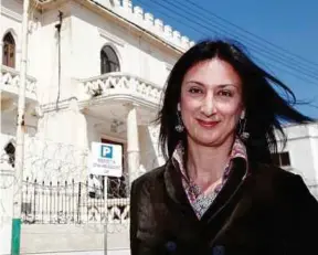  ??  ?? Investigat­ive journalist Daphne Caruana Galizia was killed in a car bomb in Malta in October.