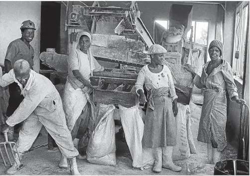  ?? Pictures: William Matlala ?? HARD LABOUR Workers at work, above, and right, Constructi­on and Allied Workers Union members strike for a better wage in Johannesbu­rg in 1991.