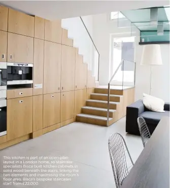  ??  ?? this kitchen is part of an open-plan layout in a London home, so staircase specialist­s Bisca built kitchen cabinets in solid wood beneath the stairs, linking the two elements and maximising the room’s floor area. Bisca’s bespoke staircases start from...