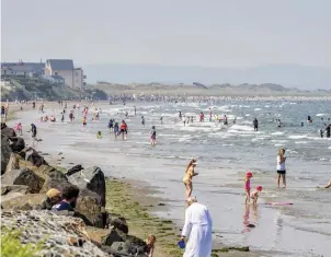  ??  ?? Scenes last week of car-free beaches at Bettystown and Laytown. Photo: Dave Stanley