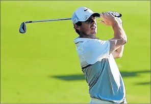  ?? Picture: GETTY IMAGES ?? GUNNING FOR TOP SPOT: Rory McIlroy on the par-five 18th hole during the final round of the DP World Tour Championsh­ip on the Earth Course at Jumeirah Golf Estates in Dubai