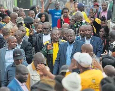  ?? Alon SKuy ?? In attendance: President Cyril Ramaphosa waves to residents at the Alexandra Stadium on Thursday after weeklong protests and marches over housing and crime that spilled over into neighborui­ng areas. /