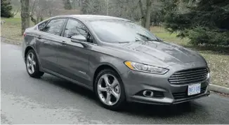  ?? BRIAN HARPER/POSTMEDIA NEWS ?? Library quiet and smooth to drive, the Fusion SE Hybrid won Green Car of the Year at the 2012 L.A. Auto Show.