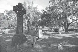  ?? RICARDO RAMIREZ BUXEDA/ORLANDO SENTINEL ?? Don Price will continue his popular nighttime tours of Greenwood Cemetery, where he shares the stories of Orlando’s founding and its notable residents and founders.