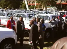  ??  ?? Bottom Pic: Chiefs view the 52 double-cab vehicles which President Mnangagwa handed over to them yesterday