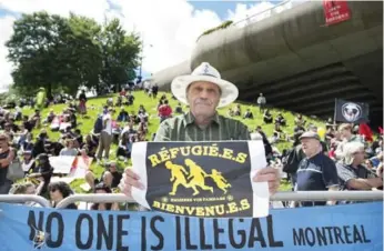  ?? GRAHAM HUGHES/THE CANADIAN PRESS ?? Montreal’s Olympic Stadium is one of several venues being used as temporary shelter for refugee claimants.