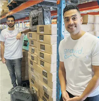  ?? J.P. MOCZULSKI FOR POSTMEDIA NEWS ?? Toronto-based Gravid.ca co-founders Omar Shahban, left, and Fahd Javed found themselves in competitio­n with bigger players after their weighted blankets became a hot product.
