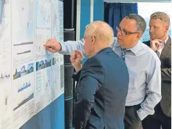  ?? Picture: Steven Brown. ?? Members of the public look over the proposals at the public consultati­on event yesterday afternoon.