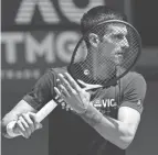  ?? MARK BAKER/AP ?? Novak Djokovic practices at Rod Laver Arena ahead of the Australian Open on Wednesday in Melbourne.